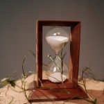 brown wooden framed hour glass